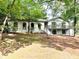Charming, bright, one-story home with a deck and beautiful landscaping at 5384 Blackhawk Dr, Acworth, GA 30102