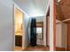 View of unfinished attic space with a window, closet, and space for renovations at 3261 N Fulton Ave, Atlanta, GA 30354