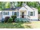 Quaint one-story home with a covered porch and a tidy, inviting yard at 3261 N Fulton Ave, Atlanta, GA 30354