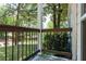 Cozy front porch offers a relaxing outdoor space with views of the landscaped yard at 3261 N Fulton Ave, Atlanta, GA 30354