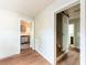Hallway with doorway views of the kitchen and stairs at 3261 N Fulton Ave, Atlanta, GA 30354