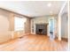 Bright living room with hardwood floors, fireplace, and ample space for entertaining guests at 3261 N Fulton Ave, Atlanta, GA 30354