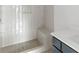 Bathroom with a shower, a built-in bench, and a vanity with a white countertop at 370 Chicopee Dr, Marietta, GA 30064