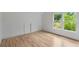 Bedroom with hardwood floors, neutral walls and a window that provides natural light and an outside view at 370 Chicopee Dr, Marietta, GA 30064