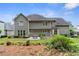 An exterior home view from the backyard features an outdoor patio set at 3765 Peachbluff Ct, Duluth, GA 30097