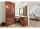 Bathroom area features a dressing table, sink and view into the primary bedroom at 3765 Peachbluff Ct, Duluth, GA 30097