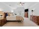 Spacious primary bedroom with vaulted ceiling, large windows, and ample closet space at 3765 Peachbluff Ct, Duluth, GA 30097
