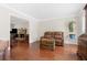 Inviting living room featuring hardwood floors, an open layout, and ample seating at 3765 Peachbluff Ct, Duluth, GA 30097
