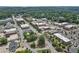 Scenic aerial view of a charming town, highlighting local businesses and the surrounding landscape at 42 Riverdale St, Canton, GA 30114