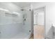 Modern bathroom featuring a glass shower with a rainfall showerhead and white tile at 42 Riverdale St, Canton, GA 30114