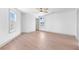 Bedroom features neutral decor, hardwood floors, and an abundance of natural light at 42 Riverdale St, Canton, GA 30114