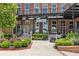 Attractive brick shopping center with well-kept landscaping and inviting storefronts, perfect for a day out at 42 Riverdale St, Canton, GA 30114
