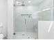 Modern shower with glass door, a built-in niche, and sleek fixtures for a luxurious feel at 42 Riverdale St, Canton, GA 30114