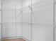 Well-organized walk-in closet with ample shelving, ideal for storage at 42 Riverdale St, Canton, GA 30114