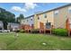 Image featuring wooden decks and lush green space in backyards; perfect for relaxing at 771 Tulip Poplar Way, Lawrenceville, GA 30044
