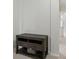 Hallway with dark wood table, drawers, baskets, and view of another room at 771 Tulip Poplar Way, Lawrenceville, GA 30044
