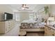 Spacious main bedroom with natural light, neutral colors, and a view of the backyard at 771 Tulip Poplar Way, Lawrenceville, GA 30044