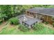 Open air deck with built-in benches is perfect for entertaining in the lush backyard at 1747 Remington Rd, Atlanta, GA 30341