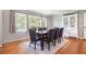 Bright dining room with hardwood floors, hutch, and large windows at 1747 Remington Rd, Atlanta, GA 30341