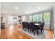 Elegant dining room with hardwood floors, large windows, and seating for eight at 1747 Remington Rd, Atlanta, GA 30341