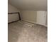 Finished attic features carpet and drywall and the trim and frames for the window at 731 Hanover Se Ln, Marietta, GA 30067