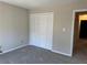 Carpeted bedroom featuring a closet at 731 Hanover Se Ln, Marietta, GA 30067