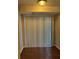 The dining area is lit by a flush mount light fixture and features tile flooring and a sliding glass door at 731 Hanover Se Ln, Marietta, GA 30067