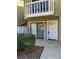 Townhouse with a well-maintained garden, sliding glass door, and a storm door at 731 Hanover Se Ln, Marietta, GA 30067