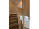 Carpeted stairs with white railing, showing the transition to the upper level at 731 Hanover Se Ln, Marietta, GA 30067