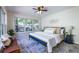 Bright bedroom with large window, ceiling fan and modern decor at 1001 Dancing Fox Rd, Decatur, GA 30032