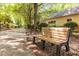 Inviting bench with 'Sustainability' inscription, nestled along a tree-lined path, perfect for relaxation at 1001 Dancing Fox Rd, Decatur, GA 30032