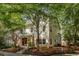 Charming two-story home with well-maintained lawn and mature trees offering shade at 1001 Dancing Fox Rd, Decatur, GA 30032