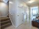 Entryway with staircase and hallway leading into the living room at 1001 Dancing Fox Rd, Decatur, GA 30032