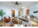 Spacious living room filled with natural light, featuring a fireplace and an open floor plan at 1001 Dancing Fox Rd, Decatur, GA 30032