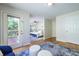 View of the bedroom from the sunroom featuring ensuite bath and exterior deck at 1001 Dancing Fox Rd, Decatur, GA 30032