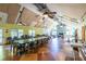Spacious meeting room has an expansive table, chairs, fireplace, lots of seating, and natural light at 1001 Dancing Fox Rd, Decatur, GA 30032