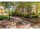Scenic walkway with mature landscaping and clear signage, leading to various neighborhood destinations at 1001 Dancing Fox Rd, Decatur, GA 30032