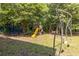 A fun playground with swings, slides, and a climbing structure, perfect for entertainment at 1001 Dancing Fox Rd, Decatur, GA 30032