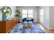 Cozy sitting room with dresser, blue sofa, and accent furniture at 1001 Dancing Fox Rd, Decatur, GA 30032