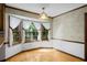 Charming breakfast nook with bay window, hardwood floors, and natural light at 1974 Skyland Glen Dr, Snellville, GA 30078
