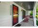 Welcoming front porch with rocking chairs, perfect for relaxing outdoors at 1974 Skyland Glen Dr, Snellville, GA 30078