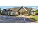 Community clubhouse with ample parking, accessible ramps, and welcoming entrance, perfect for gatherings and neighborhood events at 2548 Westchester Se Way, Conyers, GA 30013
