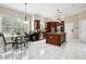 Bright kitchen with a large island, stainless steel appliances, and a breakfast nook for casual dining at 2548 Westchester Se Way, Conyers, GA 30013