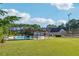 Community pool area featuring a covered seating area, perfect for relaxation and enjoyment on sunny days at 2548 Westchester Se Way, Conyers, GA 30013