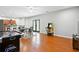 Bright recreation room with hardwood floors, arcade game, air hockey and kitchen at 2548 Westchester Se Way, Conyers, GA 30013
