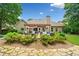 Beautiful backyard with patio, pergola, plantings and manicured lawn at 3633 Gilpin Ct, Lawrenceville, GA 30044