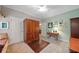 Bedroom featuring neutral colors, built-in storage, and carpet floors at 3633 Gilpin Ct, Lawrenceville, GA 30044