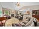 Inviting living room featuring a fireplace, wood floors, and comfortable seating at 3633 Gilpin Ct, Lawrenceville, GA 30044