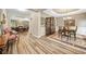 Open floor plan with formal dining and living room, hardwood floors, and decorative furniture at 3633 Gilpin Ct, Lawrenceville, GA 30044