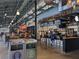 Indoor food hall featuring multiple vendors and a lively atmosphere at 7850 Willoughby Ct, Alpharetta, GA 30005